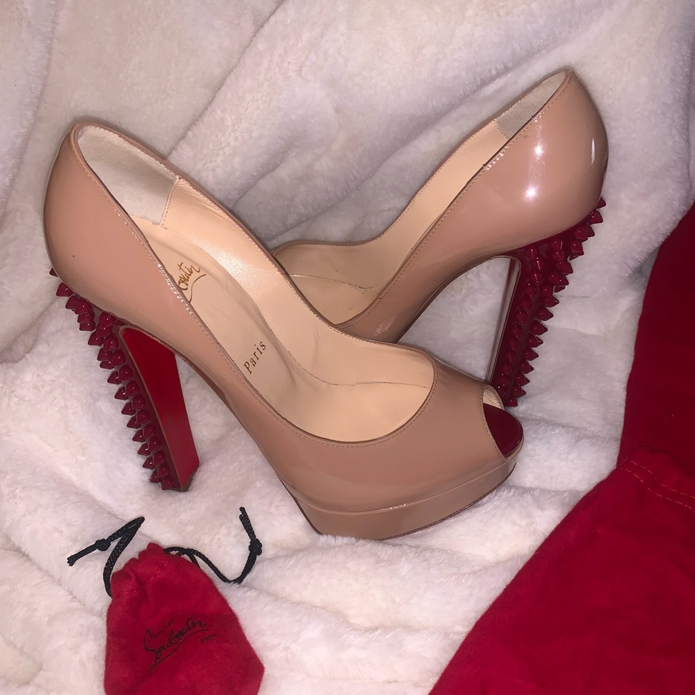 Christian Louboutin Patent nude with spikes 8.5